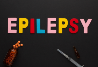 Inscription Epilepsy avec une boite de médicament et une seringue